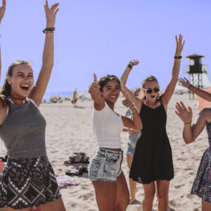 high school students celebrating at the beach in cadiz