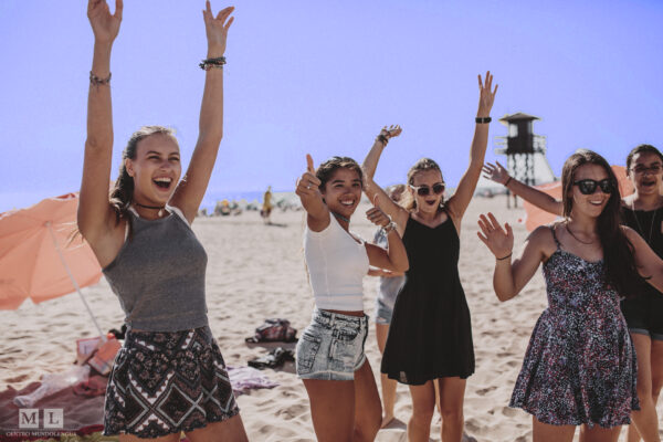 high school students celebrating at the beach in cadiz