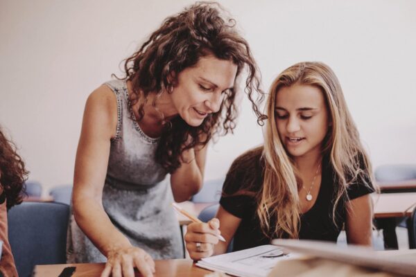 Teacher/advisor with student